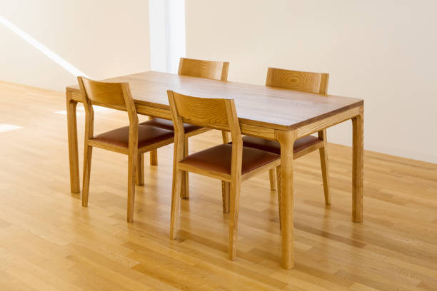 istock a four-person wooden table and chair 1069427170