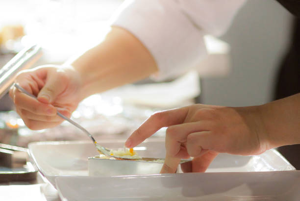 Chef preparing food, meal, in the kitchen, chef cooking, Chef decorating dish, closeup, chef at work