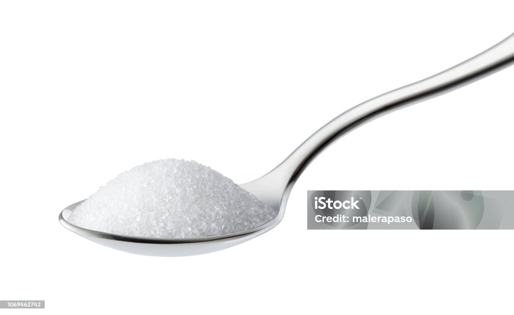 Teaspoon of sugar on white background Teaspoon of sugar on white background. Sugar - Food Stock Photo