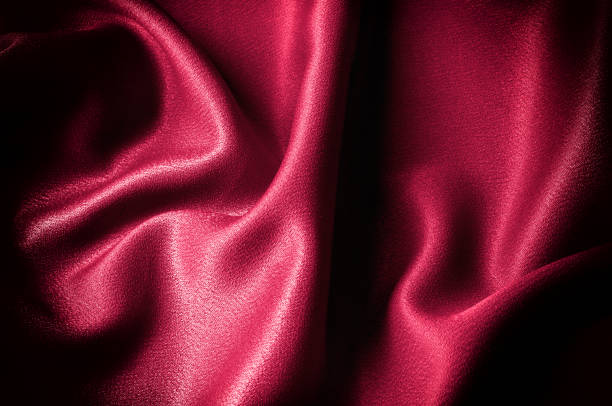 istock Texture, background. template. Silk fabric is colorful, This listing is for an exquisite and beautiful. BLEND dupioni silk fabric in red.  Crepe de Chine, stone-washed , solid color scarlet red, 1069466864