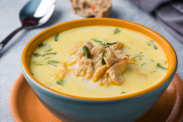 istock Pink salmon fish soup with cream in a ceramic bowl. 1069471490