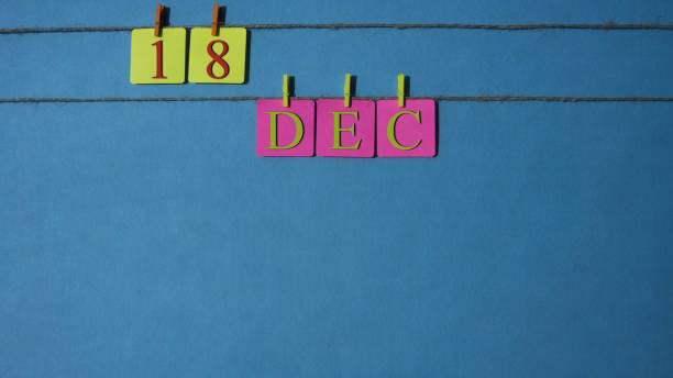 istock December, copy space with rope colored papers calendar 1069471566