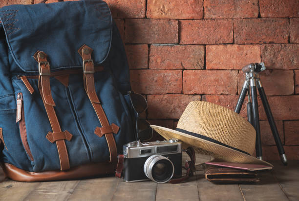 istock Old vintage canvas bag with vintage camera 1069486248