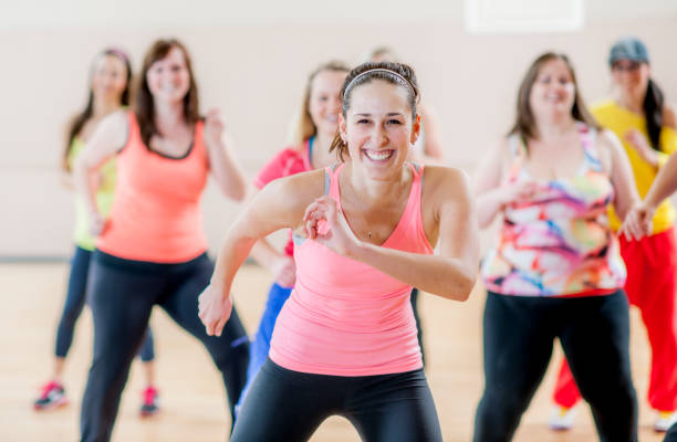 istock Woman in Dance Fitness Class Laughing 1069494840