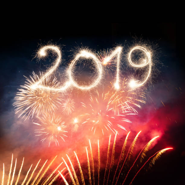 istock Sparkler Happy New Year 2019 With Fireworks 1069499868