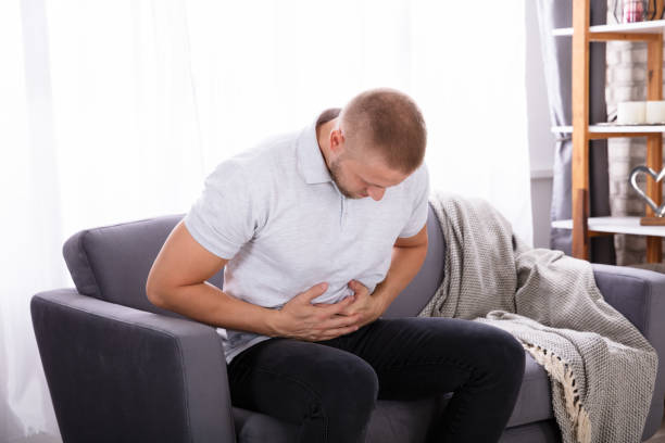 istock Man Having Stomach Pain 1069502760