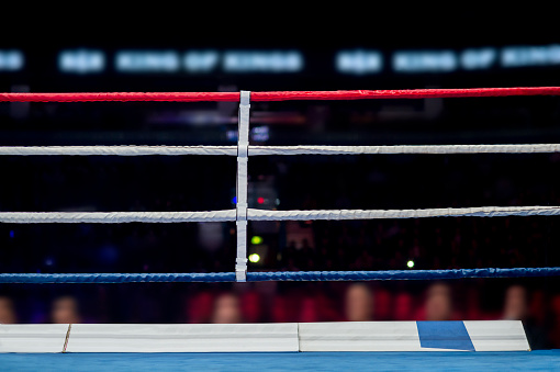 Empty boxing ring abstraction with defocused lights