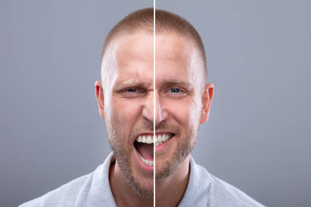 istock Man's Face Showing Anger And Happy Emotions 1069504686
