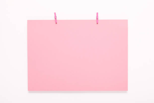 istock paper card on clothes peg on white background 1069504804