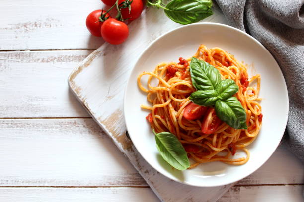 Spaghetti with tomato sauce. Copy space. Top view. italian food stock pictures, royalty-free photos & images