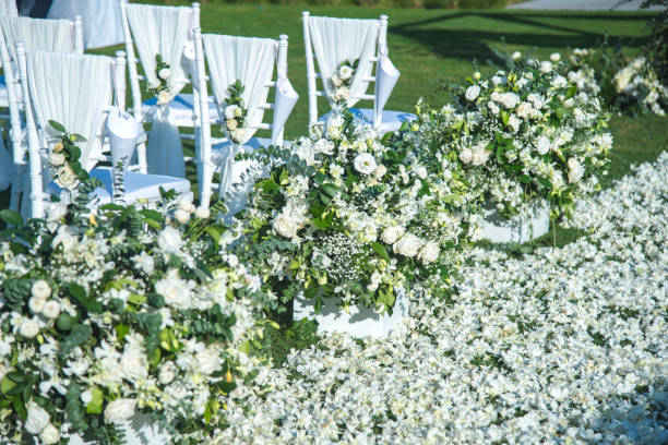 istock Chair decorated with flowers in Wedding ceremony. 1069506860