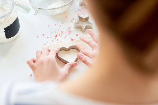 istock Woman making homemade cakes 1069514634