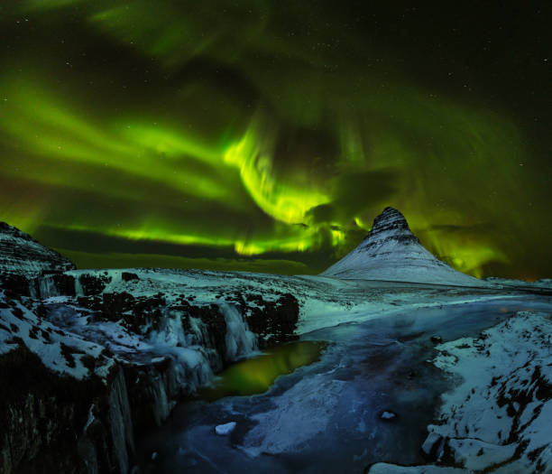istock Aurora borealis with Kirkjufell mountain in winter, Iceland 1069515030
