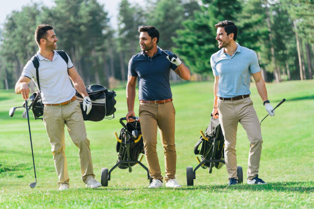 istock Friends Playing Golf on a Beautiful Sunny Day 1069516870