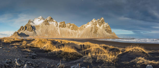 istock Vestrahorn mountains with dramatic sky with clouds, Iceland 1069517408