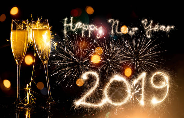 istock Champagne Glasses With Sparkler Happy New Year 2019 1069520990
