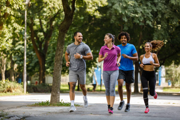 istock Friends running together outdoors 1069523588
