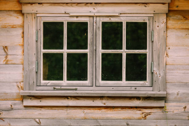 istock Old vintage dark wooden window, rural design concept. 1069528448