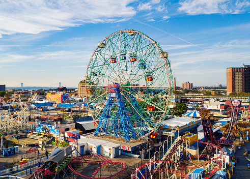 New York, USA - September 26, 2017:  Wonder wheel at Coney island amusement park aerial view. Located In southern Brooklyn along the waterfront it is a entertainment hot spot of NYC