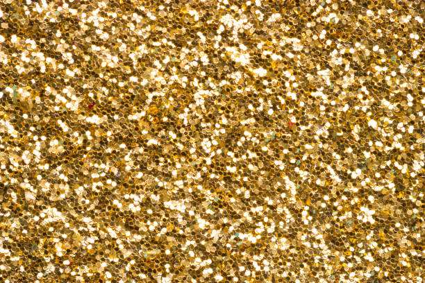 istock abstract defocused blurred gold background, christmas background 1069540798