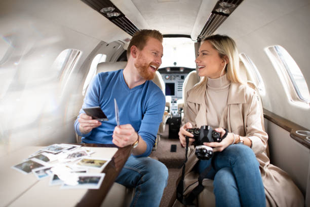 istock Rich young tourist couple inside a private airplane 1069541822