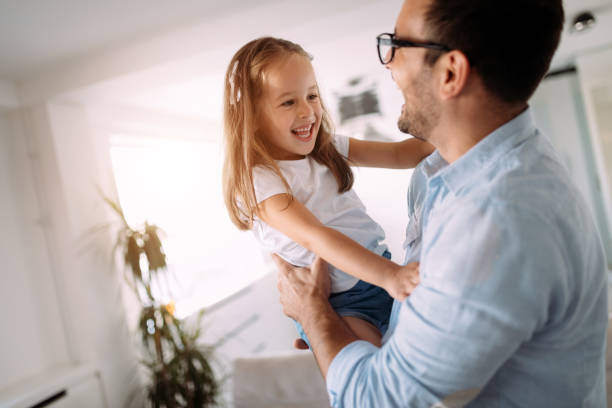 istock Happy family having fun time at home 1069542362