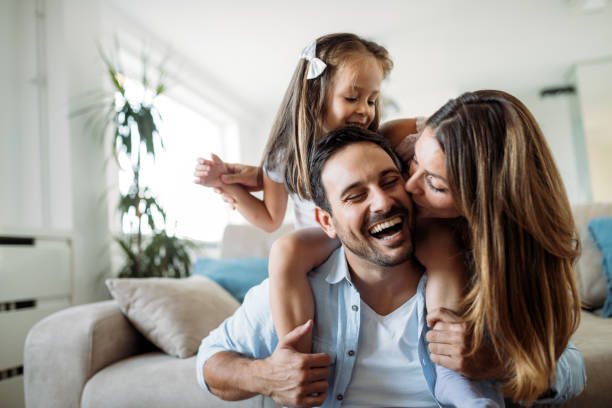 istock Happy family having fun time at home 1069542442