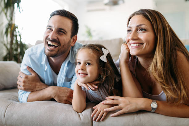 istock Happy family having fun time at home 1069542444