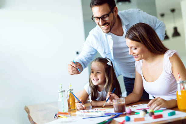 istock Happy family having fun time at home 1069542480