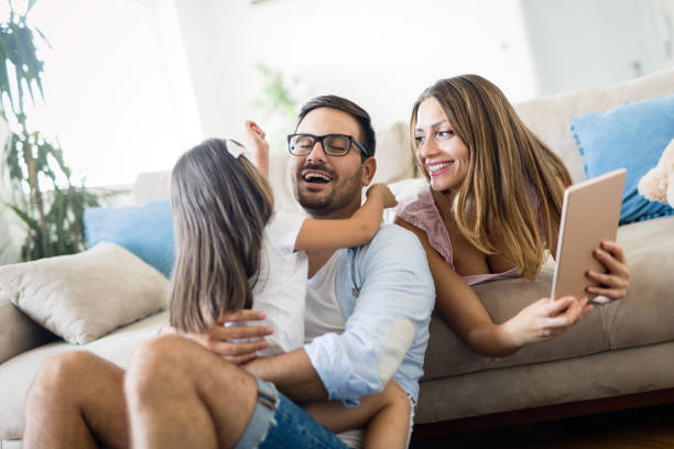 istock Happy family having fun time at home 1069542516
