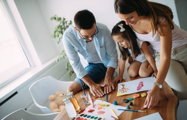 istock Happy family having fun time at home 1069543660
