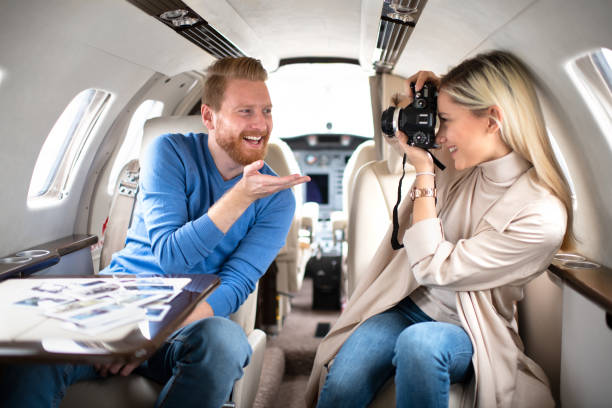 istock Rich young tourist couple inside a private airplane 1069543898