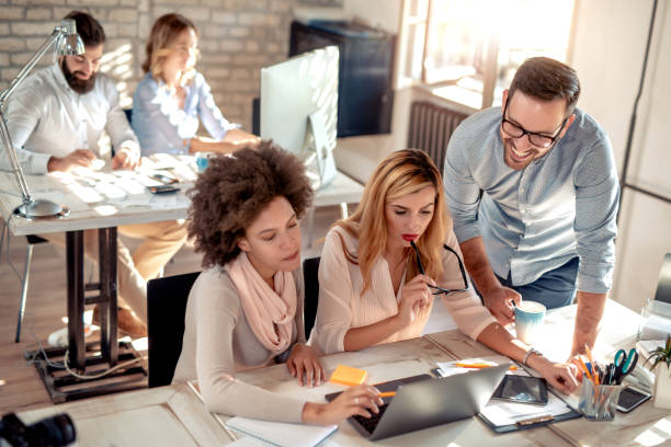 istock Business team sitting in office and planning work 1069544170