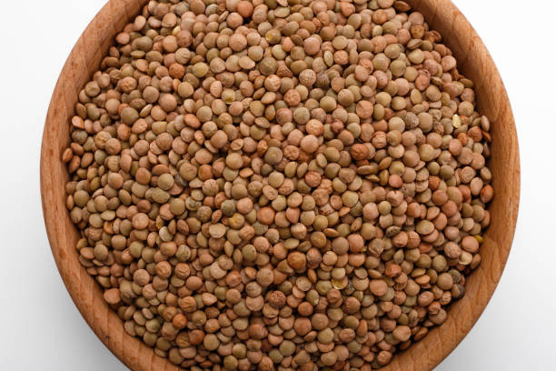 istock raw lentils on a white acrylic background 1069544474