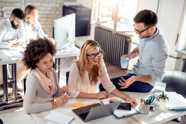 istock Business team sitting in office and planning work 1069544486