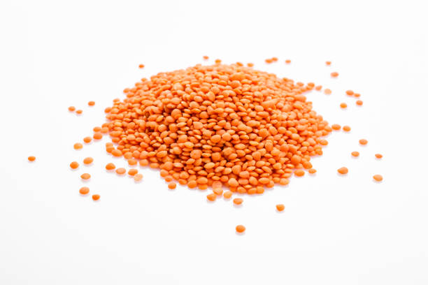 istock raw lentils on a white acrylic background 1069544818