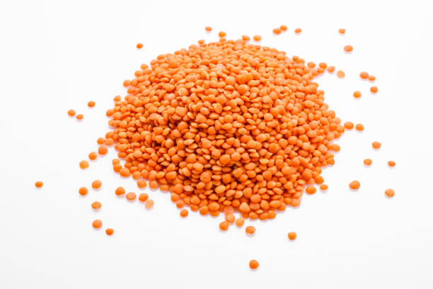 istock raw lentils on a white acrylic background 1069544828