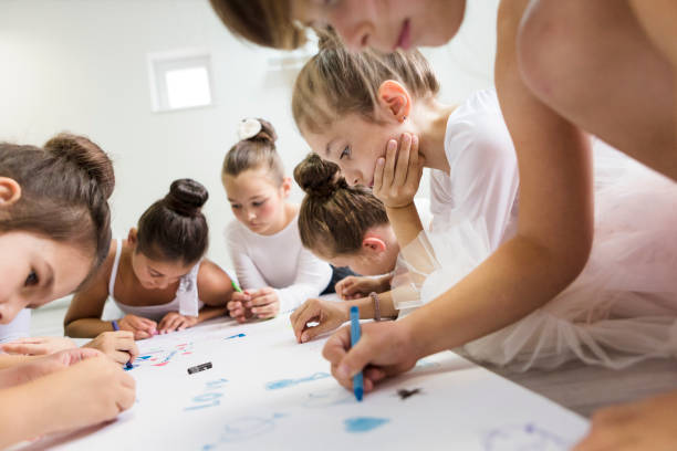 istock Children Drawing With Colored Pencils 1069544836