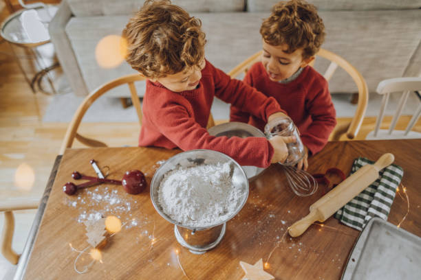istock Boys cooking christmas cookies 1069546352