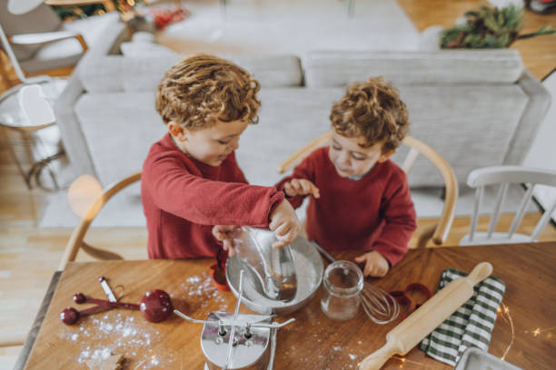 istock Boys cooking christmas cookies 1069546356