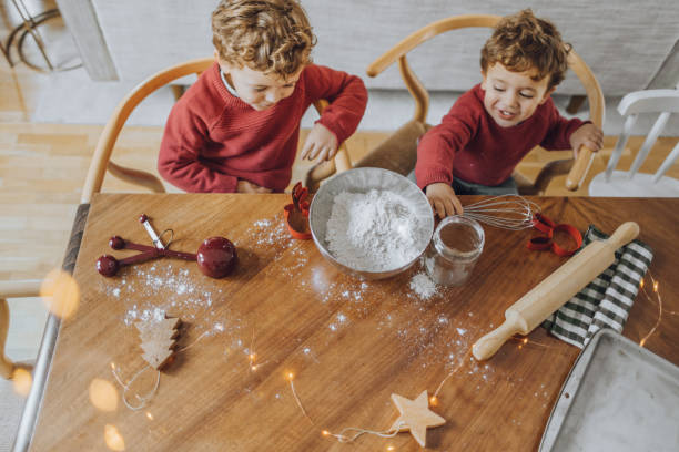 istock Boys cooking christmas cookies 1069546360