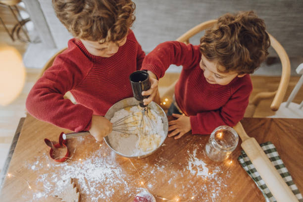 istock Boys cooking christmas cookies 1069546416