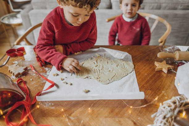 istock Boys cooking christmas cookies 1069546718