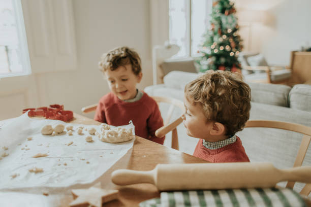 istock Boys cooking christmas cookies 1069546814