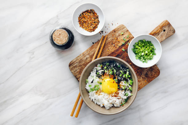 Japanese breakfast Tamago kake gohan (cooked rice topped or mixed with raw egg and soy sauce)