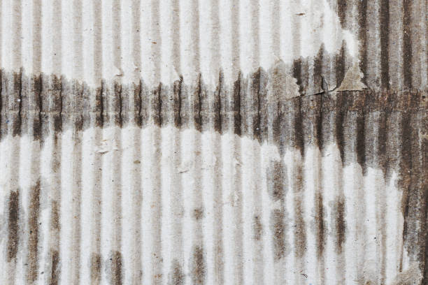 istock Old sheet of corrugated gray cardboard, texture background 1069549438