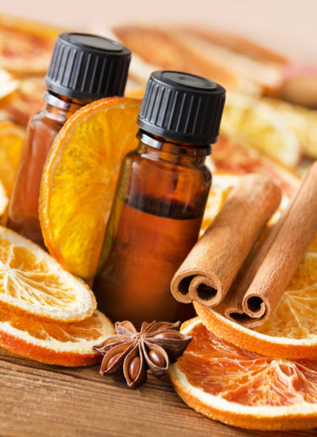 istock Winter time scent oil with oranges and cinnamon 1069549642