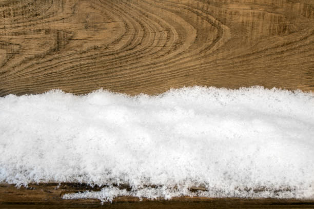 Wooden Christmas background with snow