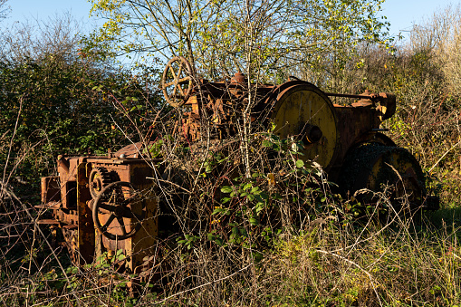 Old metal equipment on the junkyard