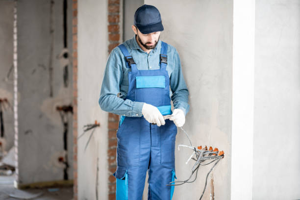 istock Electrician mounting wiring indoors 1069567826